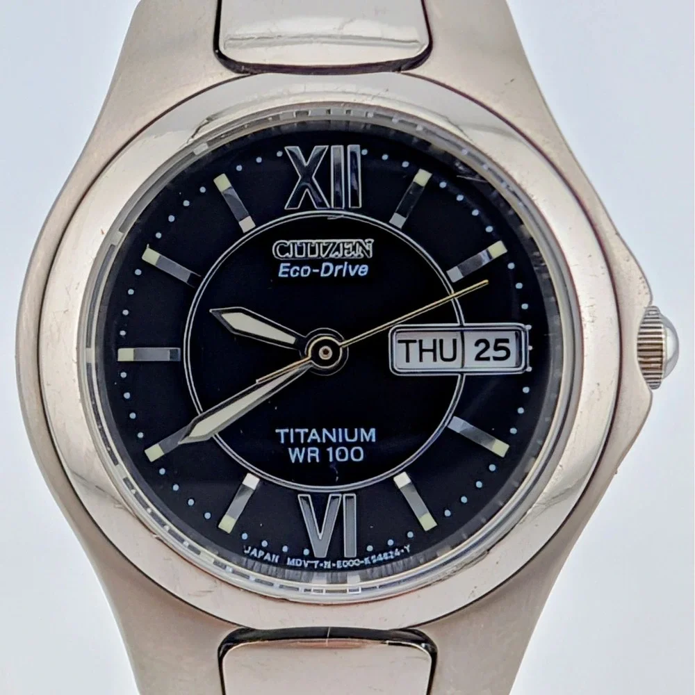 Citizen Eco-Drive Titanium E001-K18451 Women's WR100 Day Date Black Dial Watch